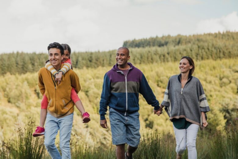 family walking in field